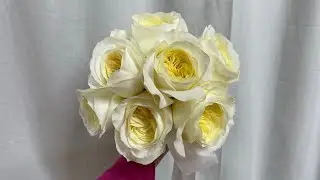 Make a tiny wedding bouquet with white garden roses