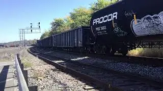 CSX Q652 WAS COMING INTO BRUNSWICK YARD TO SWITCH FREIGHT AROUND WITH TWO DPUS IN THE MIDDLE