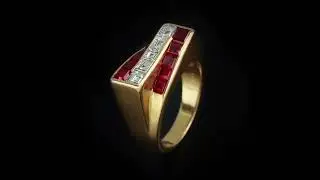 Masterclass in bold, architectural design ring, featuring channel-set, step-cut rubies & diamonds!