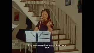 Divky! Ukrainian violinists Tonia Krysa and Yanzhima Morozova rehearse  before a concert
