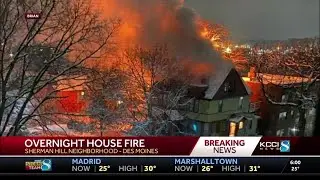 Des Moines firefighters work on overnight house fire