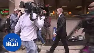 Dramatic scenes outside Baltimore court as cop acquitted - Daily Mail