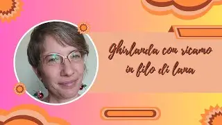 Ghirlanda con ricamo in filo di lana