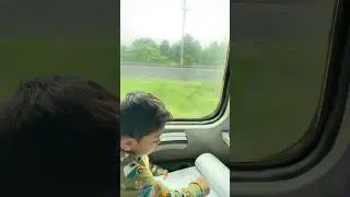 Baby in Train👶🏻#trending #cutebaby #viralvideo #baby #youtubeshorts #cute #train #journey #rain