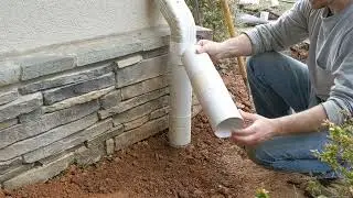 Gutter downspout quick and easy disconnect to PVC ground pipe.
