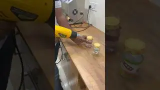 Bottle top shrink wrapping using hot air gun | PVC shrink sleave for bottle #hotairgun