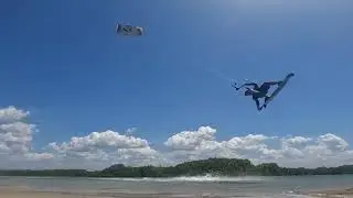 Kiteboarding backroll kite loop nose grab
