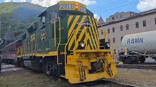 RBMN 2013 and 2023 with T-1 class steam locomotive #2102 whistle in the background 