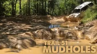 Splashing through the mud on Trail 51 at Windrock Park!
