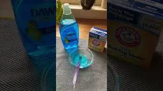 How do I get grease or other stains out of my clothes?