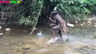 Primitive life - Forest people and ethnic girl fishing by hand - Primitive survival skills
