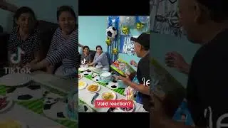 Kid slaps birthday cake