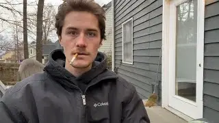 Smoking a Cigarette While Recording a Video About Smoking a Cigarette