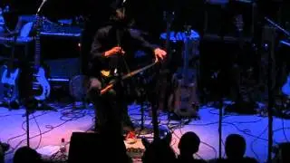 Julian Koster playing singing saw