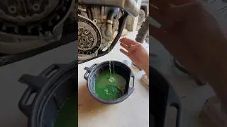 Removing the water pump on a 2011 KTM 350 SX-F and checking the water seal.