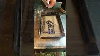 Making a tin type photo with 1850s camera
