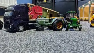 Model farm stop motion delivering a scraped abandoned 3140 jd and clean 3350 