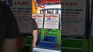 How to win: Bank-A-Ball. Throw from low with a high arc and good backspin. #carnivalgames #shorts