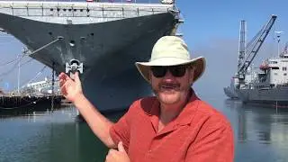 FAMILY CAR - Jeep takes over top deck of Apollo 11 aircraft carrier