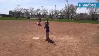 5 year old hitting off pitching machine @ Girls' Day of Baseball Clinic