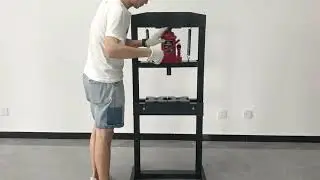 Hydraulic shop press with bottle jack
