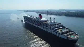 The Queen Mary 2 passes the beautiful new Everton Stadium on a calm, blue, sunlit Mersey 💙🛳️⚽️