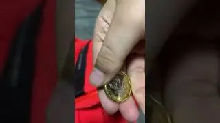 Shiny coin from Singapore
