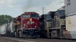 Two trains meet in Whiting, IN. Canadian Pacific meets a Norfolk Southern train