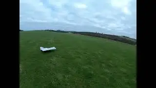 Following an RC ground effect vehicle and a model plane (FPV quad chase footage)