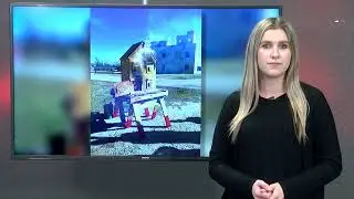 Abilene firefighters use a dollhouse to demonstrate airflow control and fire spread