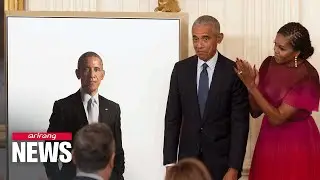 Obamas return to White House for portrait unveiling