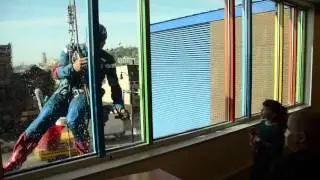 Superheroes clean Children's Hospital windows in Pittsburgh