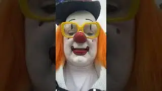Baraboo circus parade with Haw Haw the clown. James Kuhn
