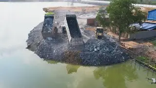 Santui Bulldozer Pushing Dirt Landfill Continue Land Filling Truck SHACMAN Lake Deep