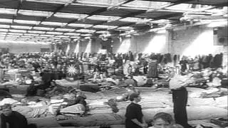 Thousands of Eastern Germans cross the border to enter Berlin in West Germany and...HD Stock Footage