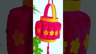Flower making of plastic bottle, red and yellow clay.