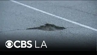 Crews rush temporary repairs to LA County potholes amid rain