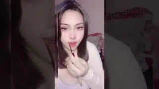 Routines - A woman with makeup and big breasts 