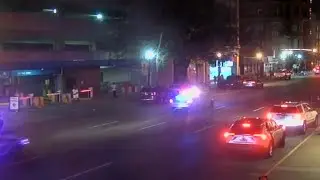 Surveillance video shows aftermath of shooting at downtown Louisville restaurant