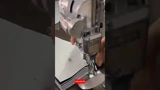 skill multiple layers of striped fabric in a textile factory workshop for garment production #pov