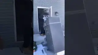 1 MAN MOVING A 750LBS GUN SAFE INTO A BASEMENT