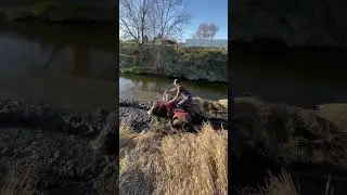 Rippin three wheeler in the mud!!