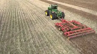 John Deere 9330 artic tractor working land with Top down cultivator in the UK