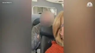Viral video of seat-punching passenger sparks debate over reclined seats on air planes
