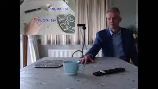 AISLA Guides a User to Pick up a Cup with Spoken Commands