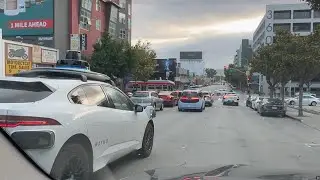 Waymo Zeekr and Jaguar iPace in San Francisco