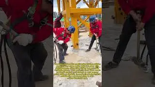 Rhythm & Bolts: Workers Hammer in Perfect Sync on Tower Crane Assembly