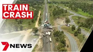 Freight train derailed then hit by another train in Central Queensland | 7NEWS