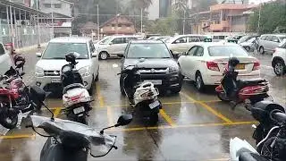 Rain in front of Dmart Udupi 🌧️