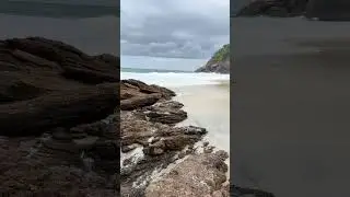 Praia da Joatinga (beach) walking past rocks - Rio de Janeiro, Brazil